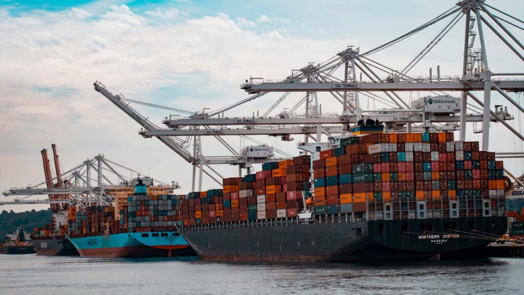 Cargo ship docked at the pier during the day